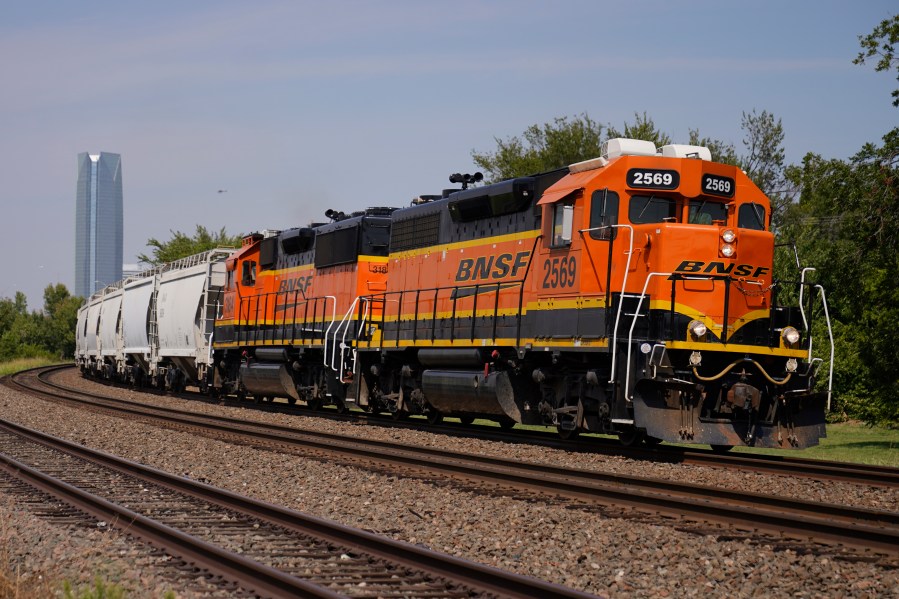 FILE - A BNSF locomotive heads south out of Oklahoma City, Sept. 14, 2022. (AP Photo/Sue Ogrocki, File)