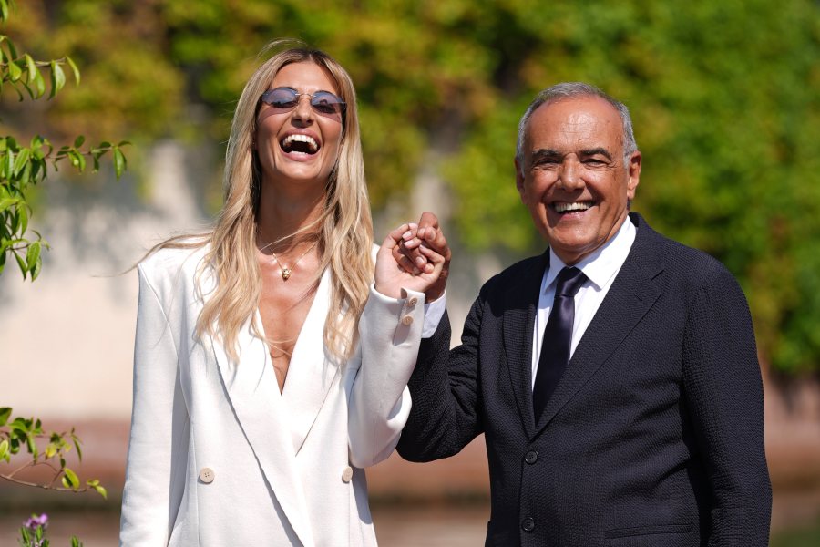 Director of the festival Alberto Barbera, right and Patroness of the festival Sveva Alviti arrive at the Excelsior pier ahead of the 81st Venice International Film Festival, Tuesday, Aug. 27, 2024 in Venice, Italy. (Gian Mattia D'Alberto/LaPresse via AP)