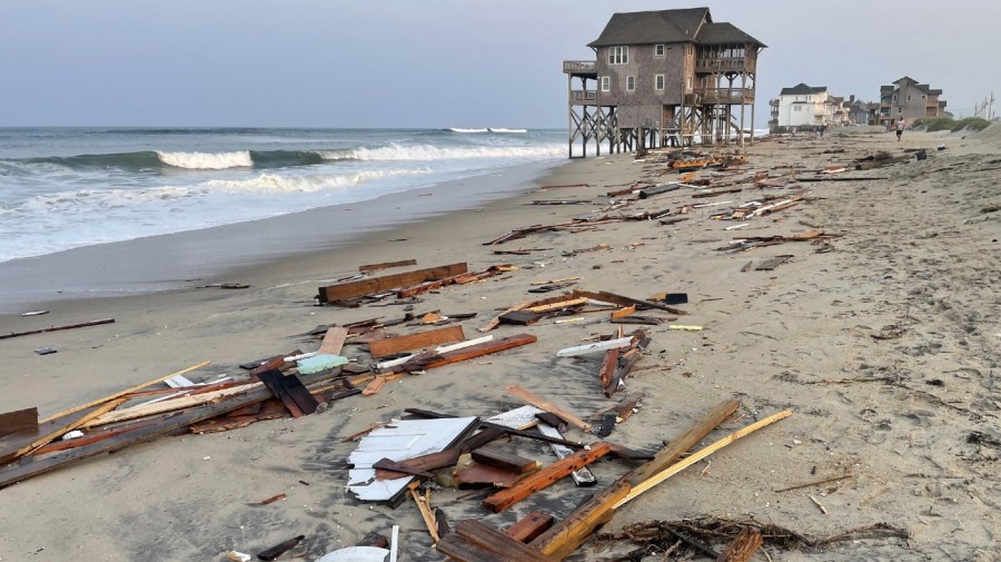 This photo provided by the National Park Service on Friday, Aug. 16, 2024, in Rodanthe, N.C., along the Cape Hatteras National Seashore shows debris from an unoccupied beach house that collapsed into the Atlantic Ocean from winds and waves caused by Hurricane Ernesto. (Cape Hatteras National Seashore via AP)