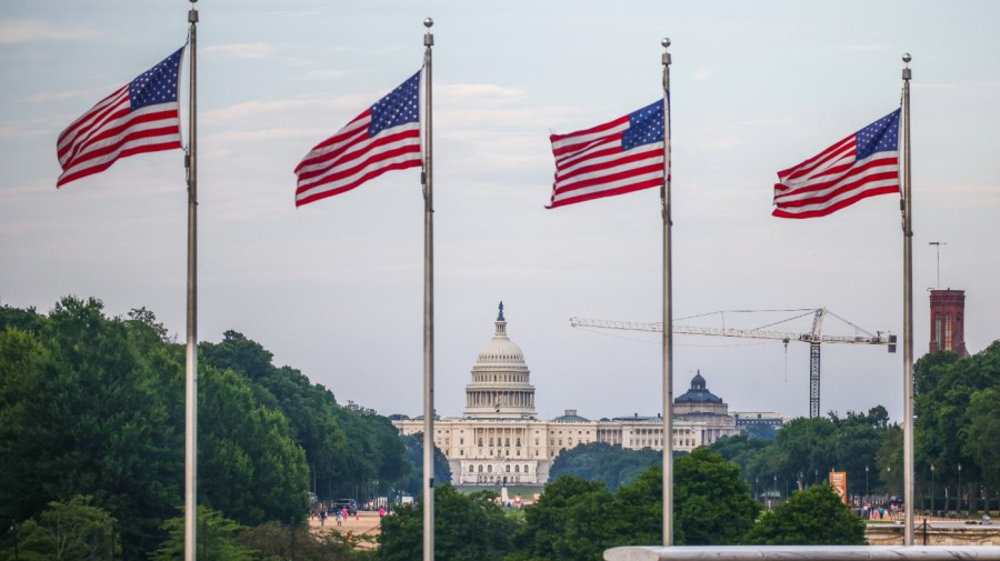 A view on the U.S. Capitol building and American flags by Washington Monument in Washington, DC in the United States of America on July 9th, 2024. (Photo by Beata Zawrzel/NurPhoto via Getty Images)