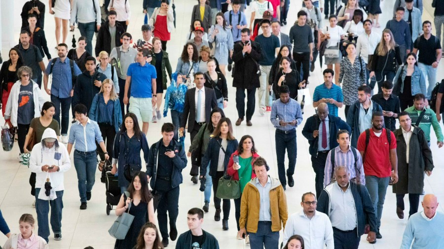 In this June 21, 2019, file photo, commuters walk through a corridor in the World Trade Center Transportation Hub, in New York. The U.S. Census Bureau is creating tighter privacy controls in response to new fears that census questions could threaten the privacy of the people who answered them. But social scientists and others who use the agency’s numbers worry that the change will hurt the accuracy of the 2020 count. (AP Photo/Mark Lennihan, File)