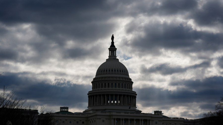 The Capitol in Washington, is framed by early morning clouds, Tuesday, March 19, 2024, as negotiators from Congress and the White House scramble to complete work on funding government agencies for the fiscal year and avoid a partial shutdown that could begin this weekend. Lawmakers have reached agreement on five of the six spending bills needed, but they clashed on funding for the Department of Homeland Security, which is responsible for securing and managing U.S. borders. (AP Photo/J. Scott Applewhite)