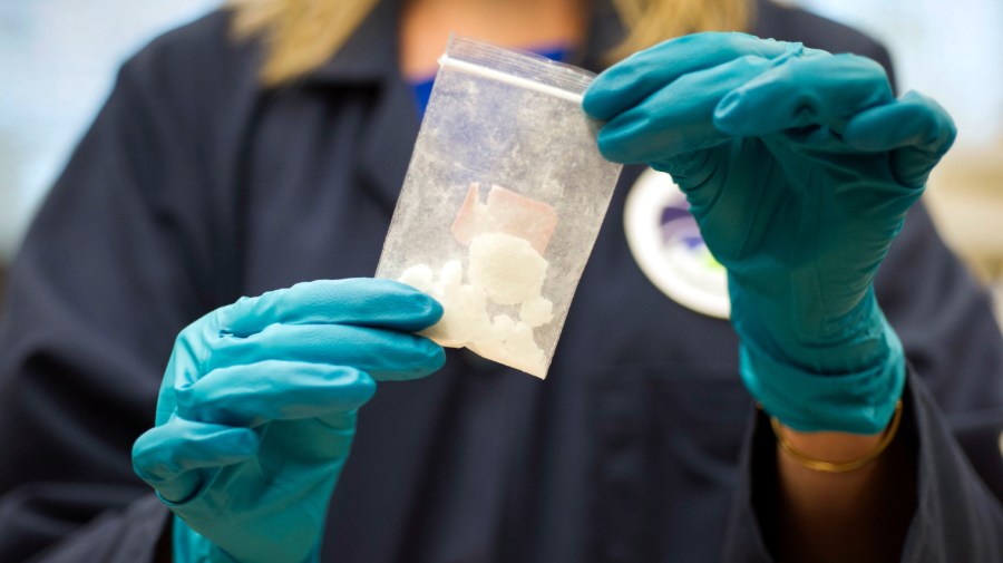 A bag of 4-fluoro isobutyryl fentanyl is displayed.