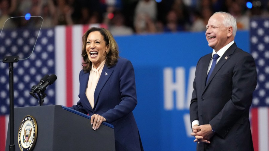 Democratic presidential candidate, U.S. Vice President Kamala Harris and Democratic vice presidential candidate Minnesota Gov. Tim Walz appear on stage together during a campaign event at the Liacouras Center at Temple University on August 6, 2024 in Philadelphia, Pennsylvania. Harris ended weeks of speculation about who her running mate would be, selecting the 60-year-old midwestern governor over other candidates. (Photo by Andrew Harnik/Getty Images)