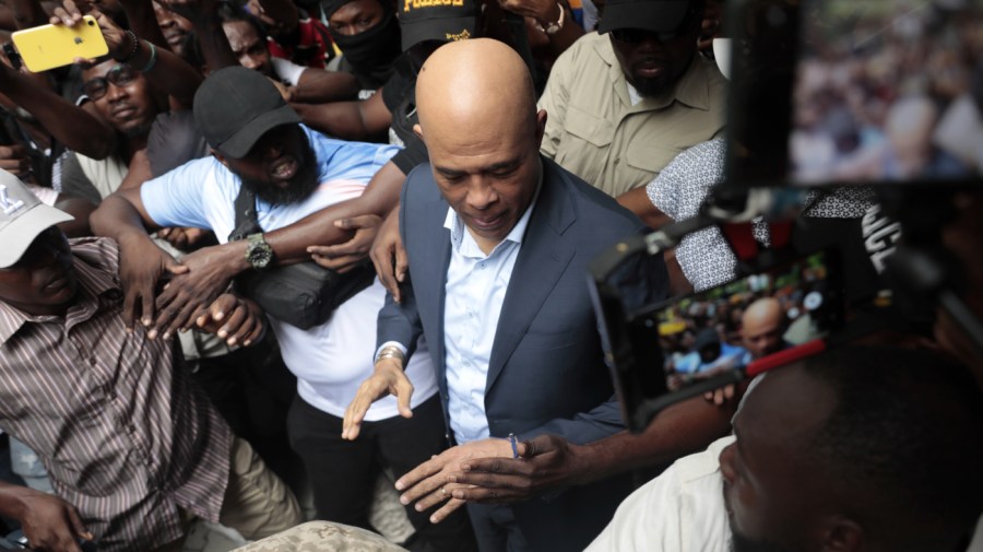 Former Haitian President Michel Martelly leaves after appearing before the investigating judge in the case of the assassination of Haitian President Jovenel Moise in Port-au-Prince, Haiti, Tuesday, Oct. 3, 2023.