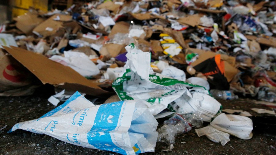 A bubble wrap mailer and a plastic water bottle are seen with other items deposited by neighborhood collection trucks collected from blue recycling bins on the tipping floor at Recology's Recycle Central on Monday, September 30, 2019 in San Francisco, CA. (Photo By Lea Suzuki/The San Francisco Chronicle via Getty Images)